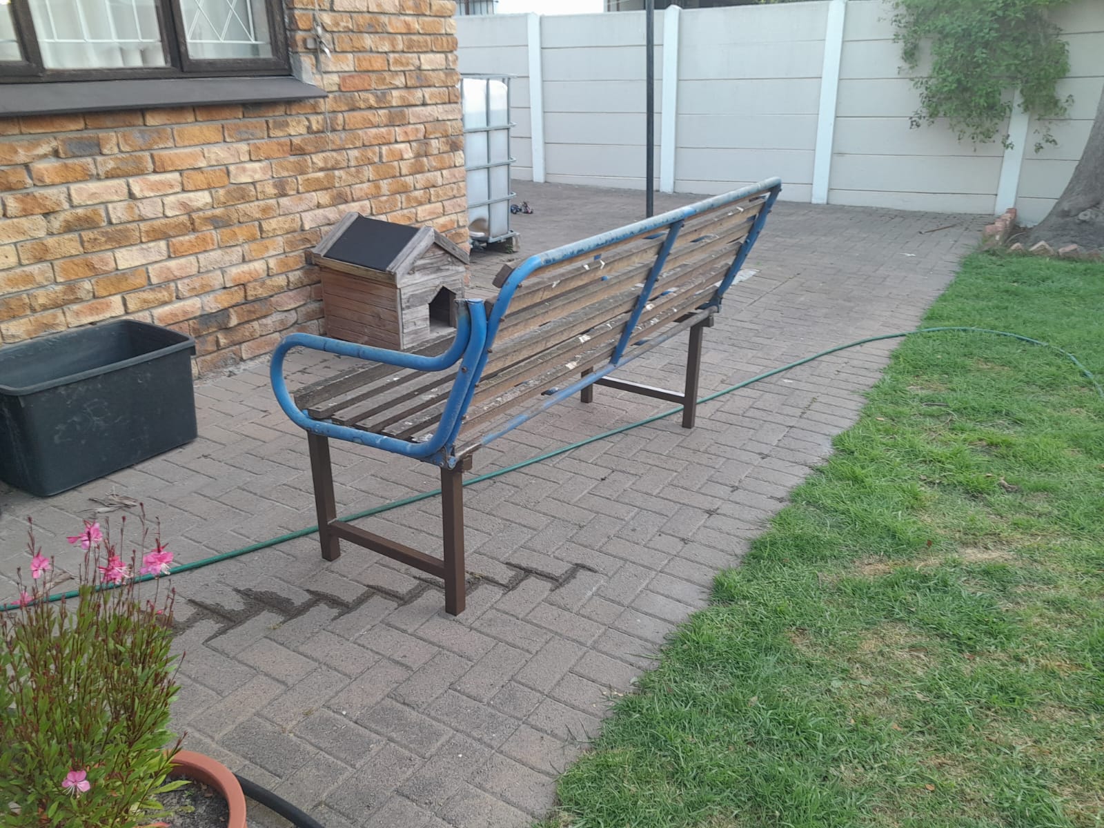Swing chair converted to garden bench