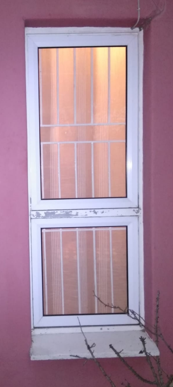White window burglar bars